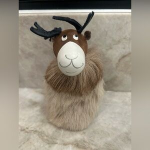 Made in Finland of wood, leather and reindeer fur. Little christmas Reindeer.